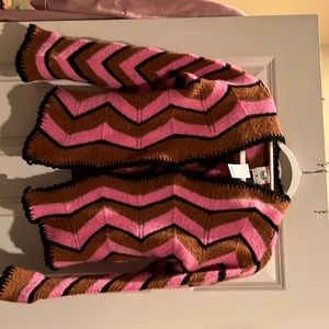 Woman’s cardigan from the store The Westside.